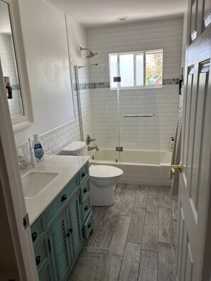 Hair dryer, towels, soap, shampoo