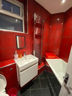Apartment | Bathroom | Combined shower/tub, deep soaking tub, towels, toilet paper
