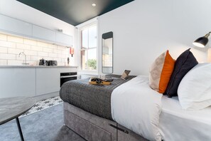 مكواة/لوح كي وواي فاي وملاءات أسرّة