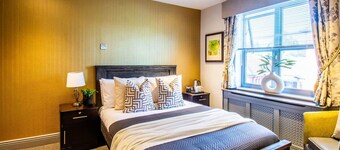 Executive Room: Private Bath, Gym Access & WiFi