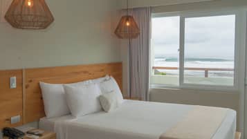 Ocean Front Queen | Premium bedding, down duvets, minibar, in-room safe
