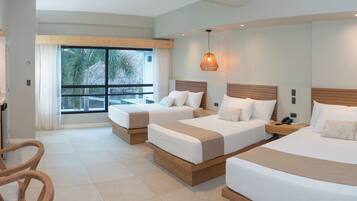 Premium bedding, down comforters, minibar, in-room safe