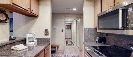 Condo, 4 Bedrooms | Private kitchen | Cookware/dishes/utensils