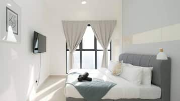 Down comforters, desk, laptop workspace, blackout drapes