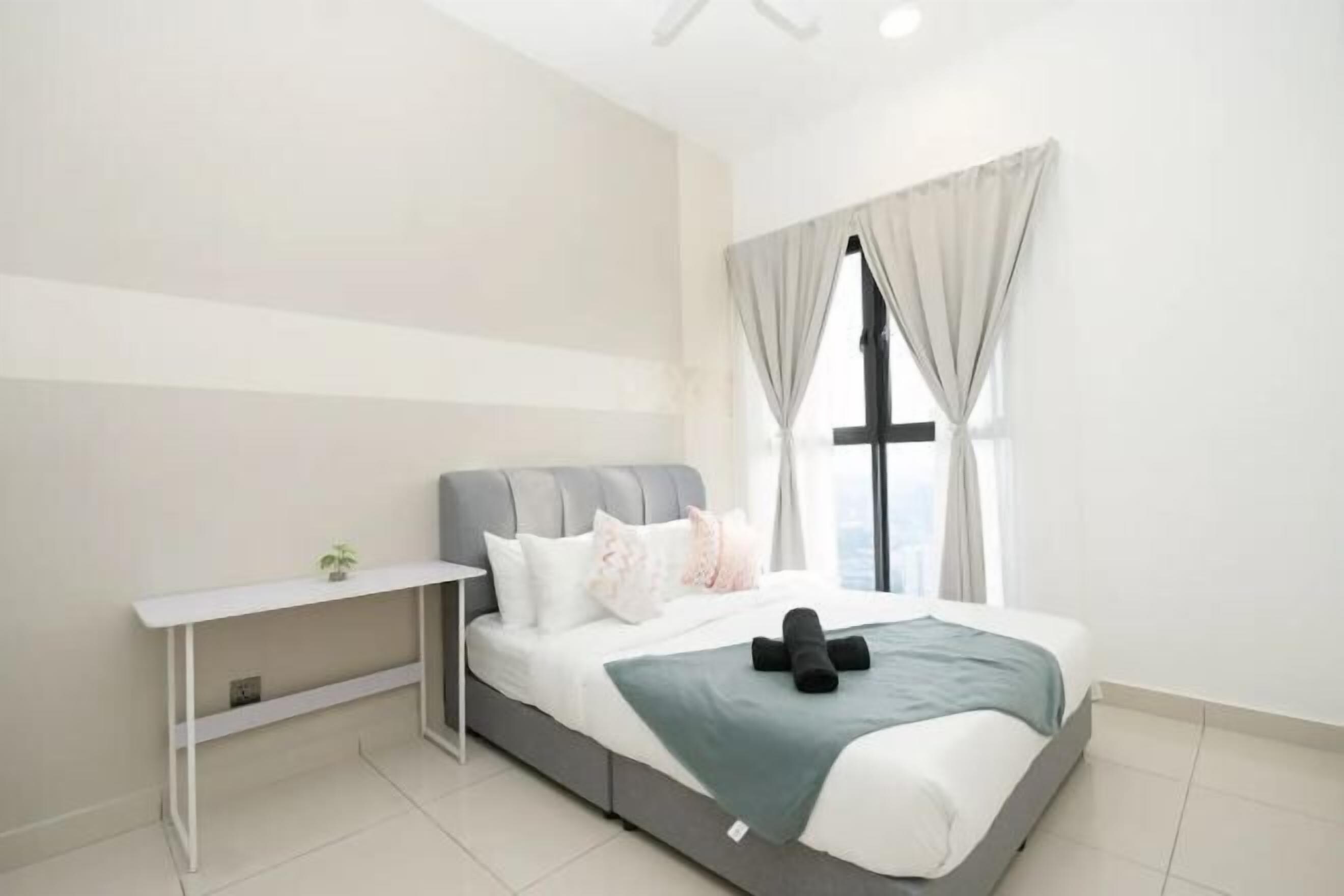 Down duvets, desk, laptop workspace, blackout curtains