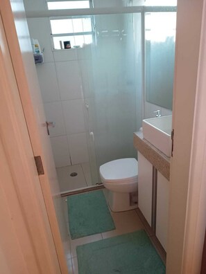 Shower, towels, toilet paper