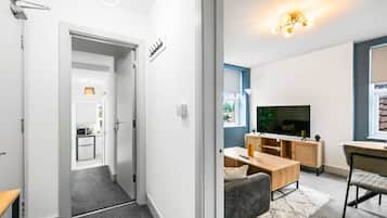 Appartement, 1 chambre | Coin séjour | TV connectée de 42 pouces avec chaînes numériques, Netflix