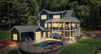 Firefly Estate, Lakefront Luxury w/ Covered Verandas + Heated Salt Pool, Hot Tub, Dock!