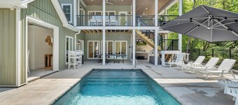 Whispering Pines Estate, Waterfront Luxury w/ Covered Verandas + Heated Salt Pool, Hot Tub, Dock!
