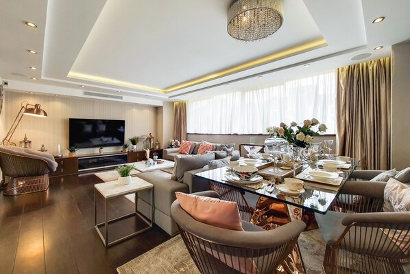 Family Apartment, 4 Bedrooms | Living area | 40-inch Smart TV with digital channels - The Portman Residences (London)