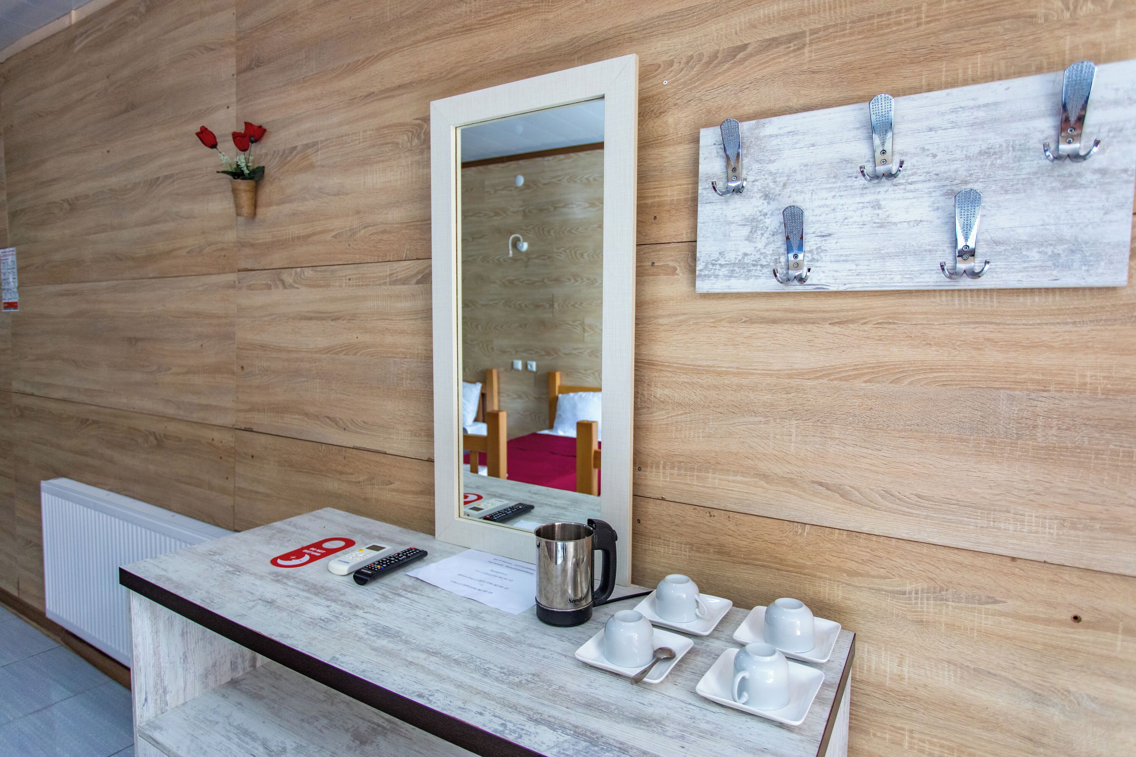 Comfort Quadruple Room, Courtyard View | Living area