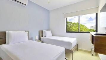 Kamar Twin Basic, pemandangan halaman | 1 kamar tidur dan dilengkapi dengan perabotan berbeda-beda