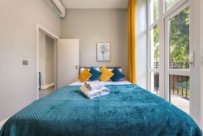 Apartamento exclusivo, 3 quartos | Cortinas blackout, ferros/tábuas de passar roupa, Wi-Fi de cortesia