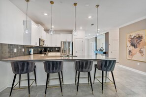 Microwave, oven, stovetop, dishwasher - New Home 9 Bedrooms and 5 Bathrooms At Storey Lake (Kissimmee)