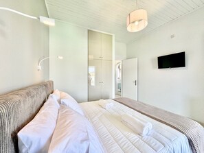 4 quartos, cofres nos quartos, ferros/tábuas de passar roupa