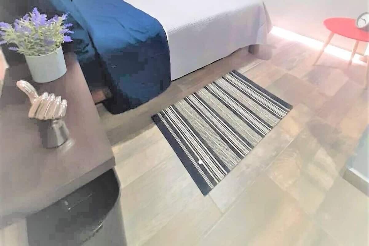Deluxe Room, Balcony, City View | In-room safe, individually decorated, desk, laptop workspace