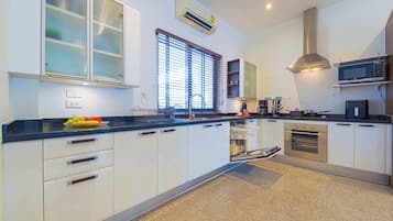 Exclusive Villa, Pool View | Private kitchen | Full-size fridge, microwave, oven, stovetop