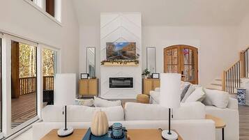 Smart-tv, een open haard, een tafeltennistafel en boeken