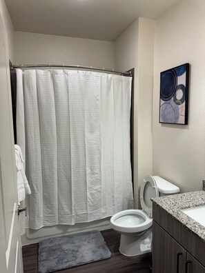 Shower, towels, soap, shampoo