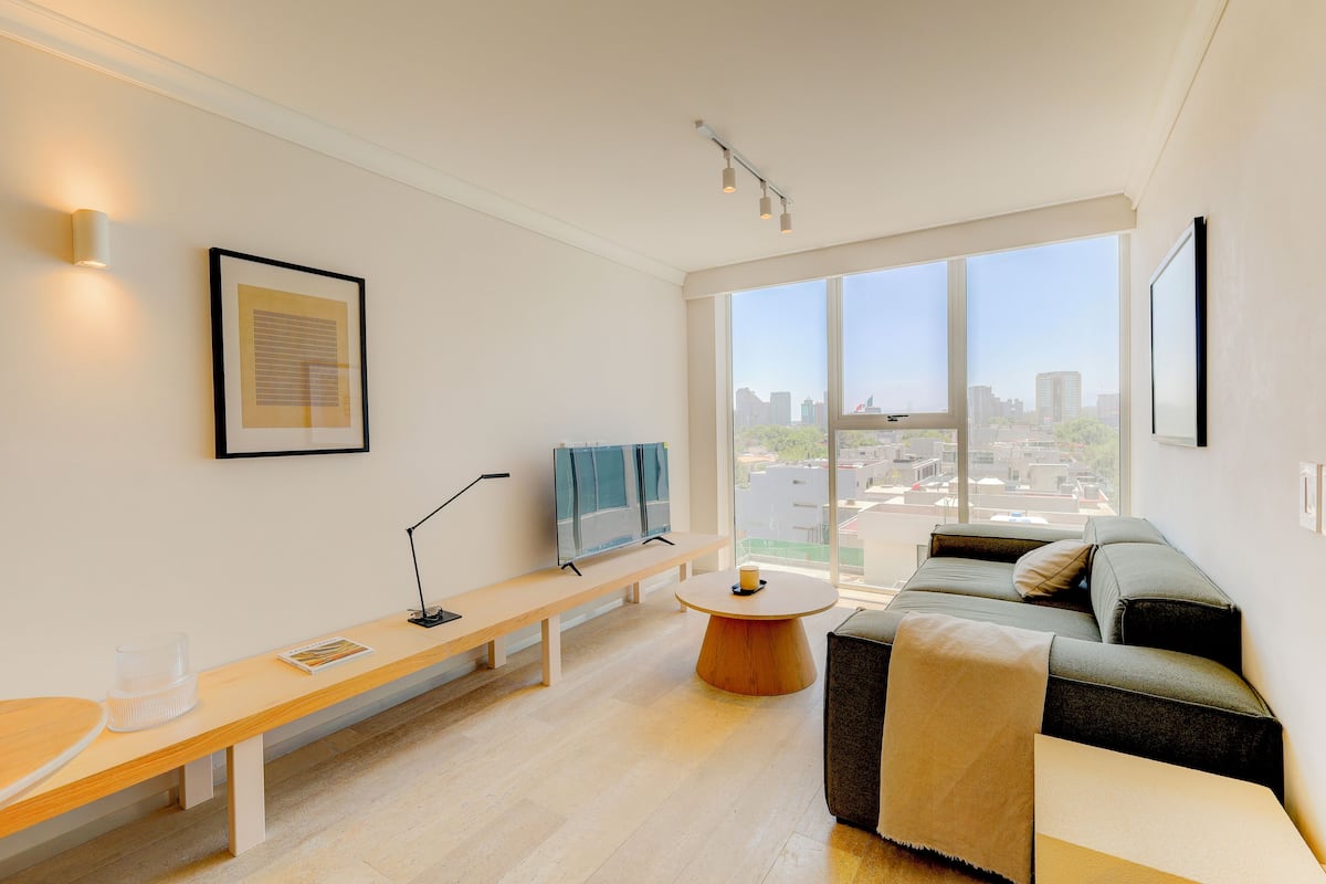 Premium Apartment, City View | Living area | 40-inch flat-screen TV with cable channels