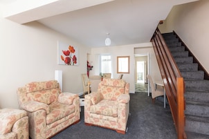 Superior House, 3 Bedrooms | Living area | 36-inch flat-screen TV with cable channels