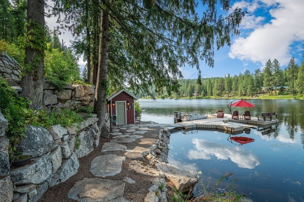 Dock house with oars, life jackets, floating mats/chair, inner tubes