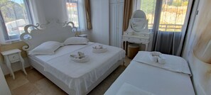 Habitación triple Deluxe | Wifi gratis