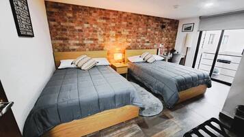 Deluxe Room, City View | Premium bedding, in-room safe, desk, laptop workspace