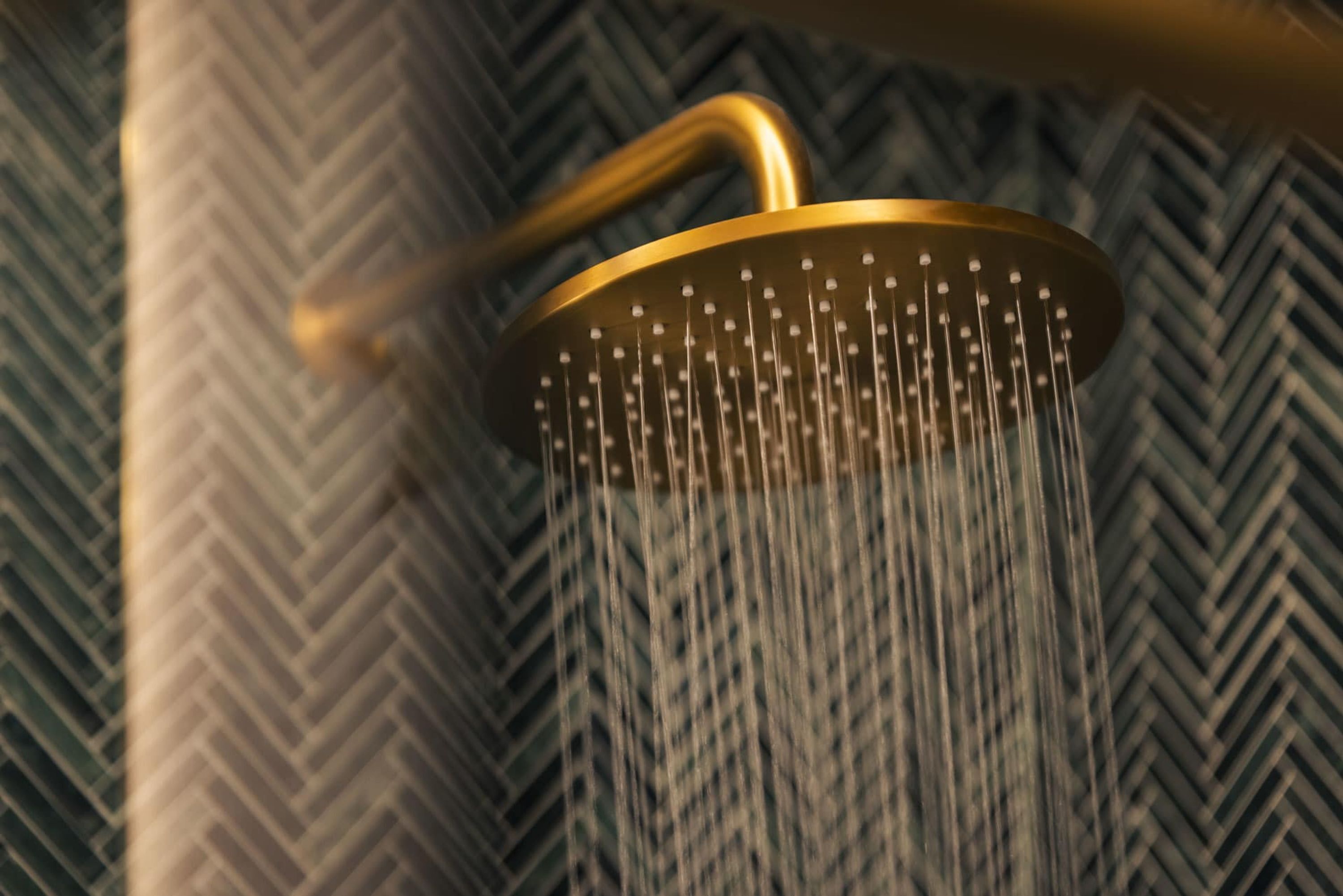 A showerhead with multiple water jets.