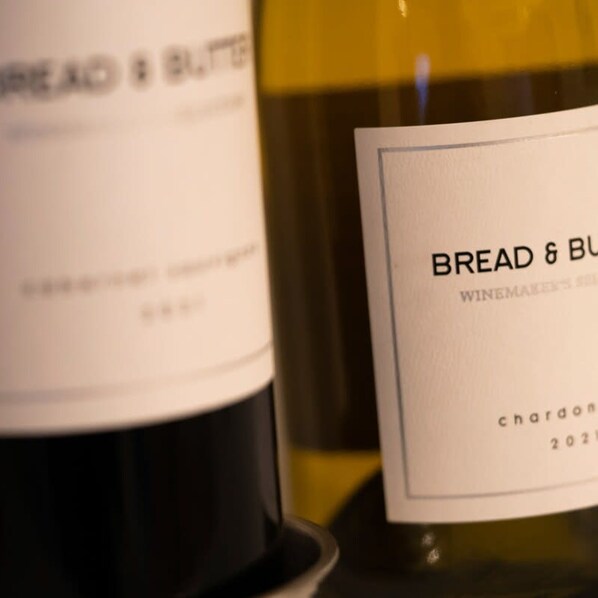 A wine bottle with a label that reads "BREAD & BUTTER" and "CHARDONNAY 2021".