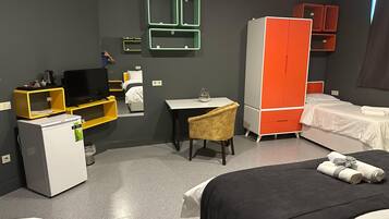 Family Room, Non Smoking, City View | In-room safe, desk, laptop workspace, iron/ironing board