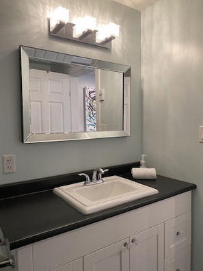 Hair dryer, towels, soap, shampoo