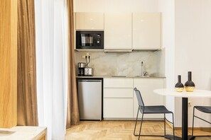 Fridge, microwave, coffee/tea maker, toaster