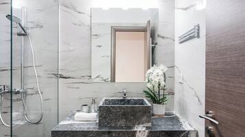 Hair dryer, towels, soap, shampoo