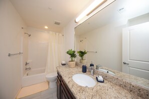 Hair dryer, towels, soap, toilet paper