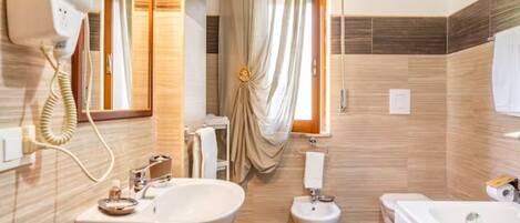 Hair dryer, bidet, towels, soap