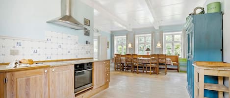 Fridge, stovetop, dishwasher, coffee/tea maker