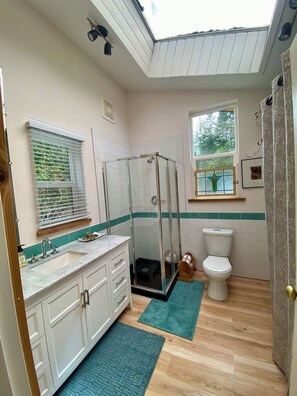 Shower, hair dryer, towels, soap