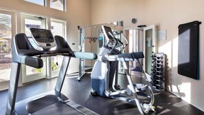 A gym with treadmills, elliptical machines, and a rack of dumbbells. - WorldMark South Mountain Preserve - 3 Bedroom (Phoenix)