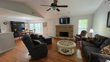 Smart TV, fireplace, books