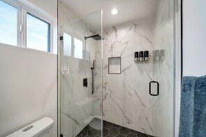 Shower, hair dryer, towels, soap