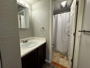 Hair dryer, towels, soap, shampoo