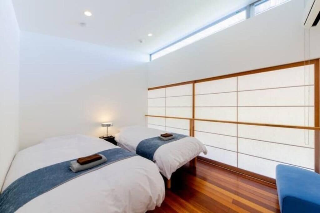 Design House | Living area | 200-inch flat-screen TV with digital channels, streaming services