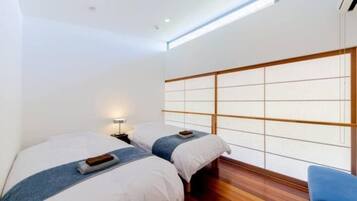 Design House | Living area | 200-inch flat-screen TV with digital channels, streaming services