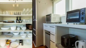 A kitchen with white cabinets, a refrigerator, a microwave, a coffee maker, and various dishes and utensils. - THE SATOYAMA HILLS　FK1 (Futtsu)