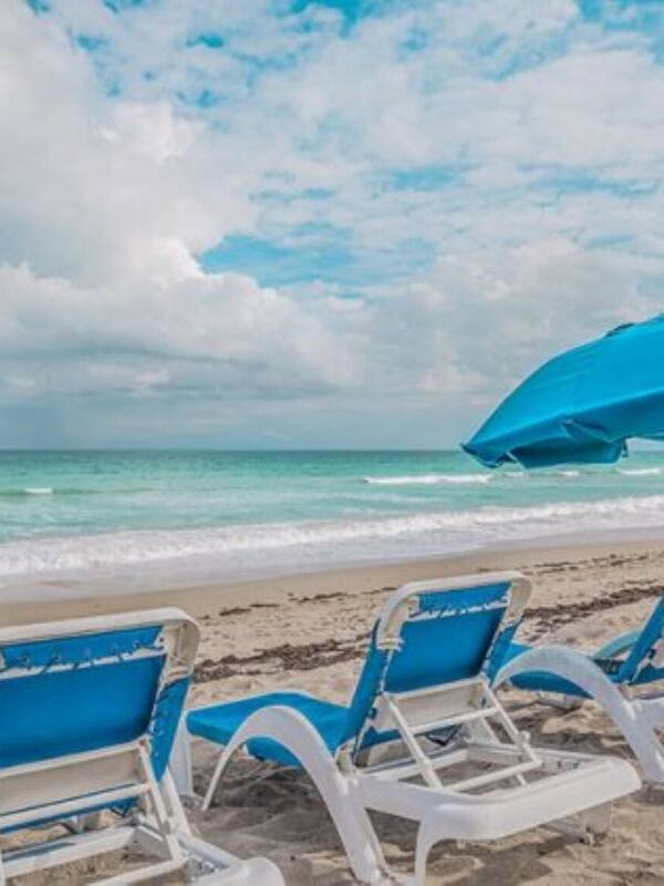 On the beach, sun-loungers, beach towels
