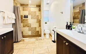 Shower, hair dryer, towels, soap