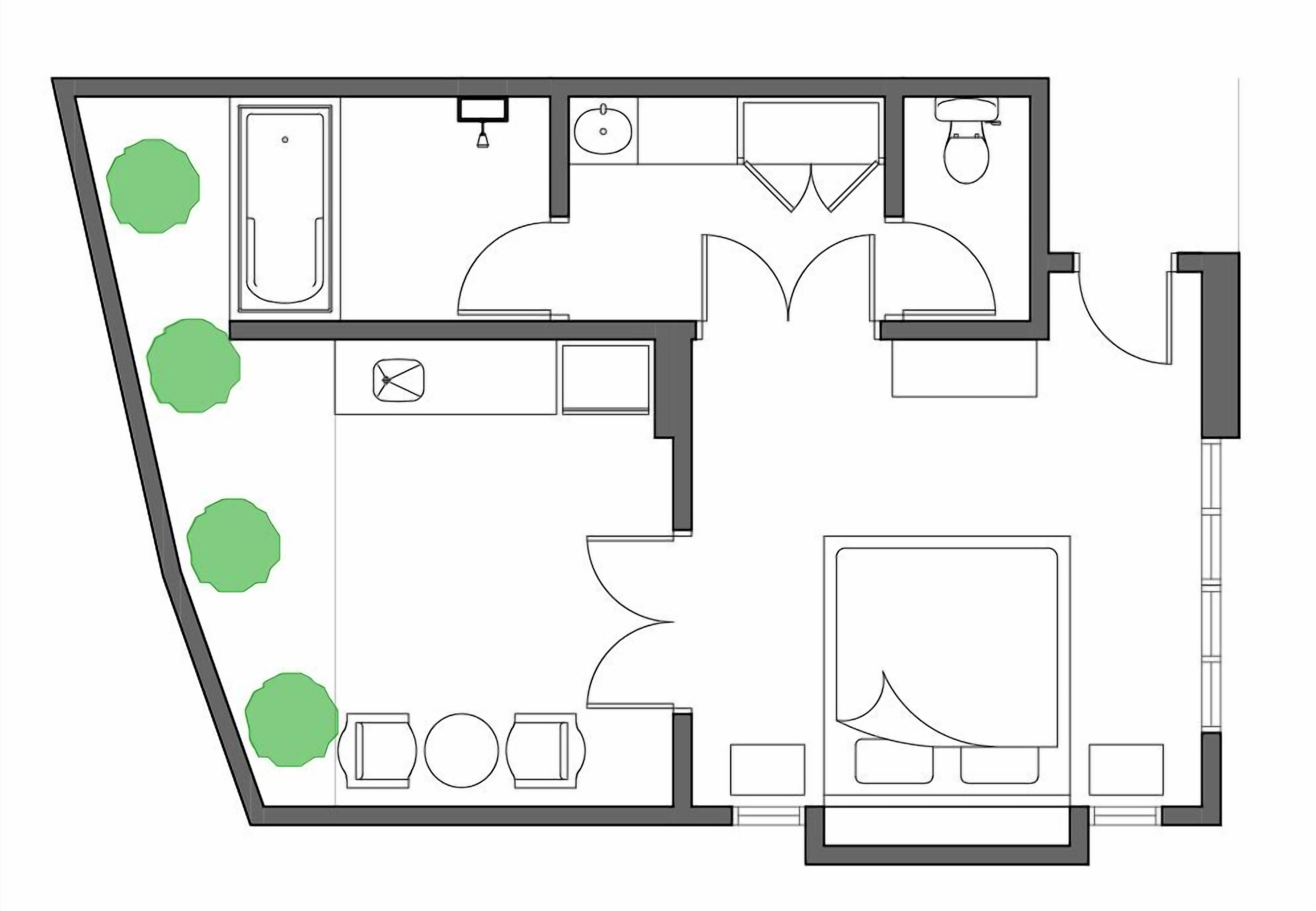 A floor plan of a hotel room with a bathroom, a kitchenette, a seating area, and a bed.