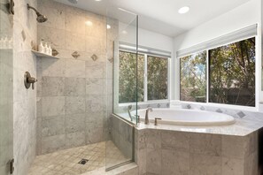 Shower, hair dryer, towels, shampoo