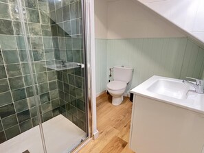 A bathroom with a glass shower enclosure, a white toilet, and a white sink. - Complete rural house for 6 people in Pedralba (Valencia). (Pedralba)